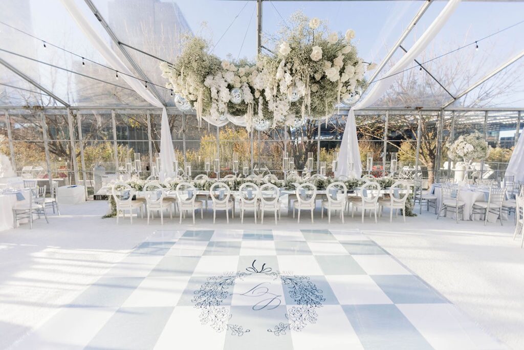 winter white wedding reception with blue and white dance floor
