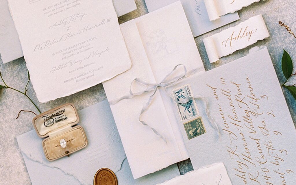 Handmade paper wedding invitations for carmel valley wedding